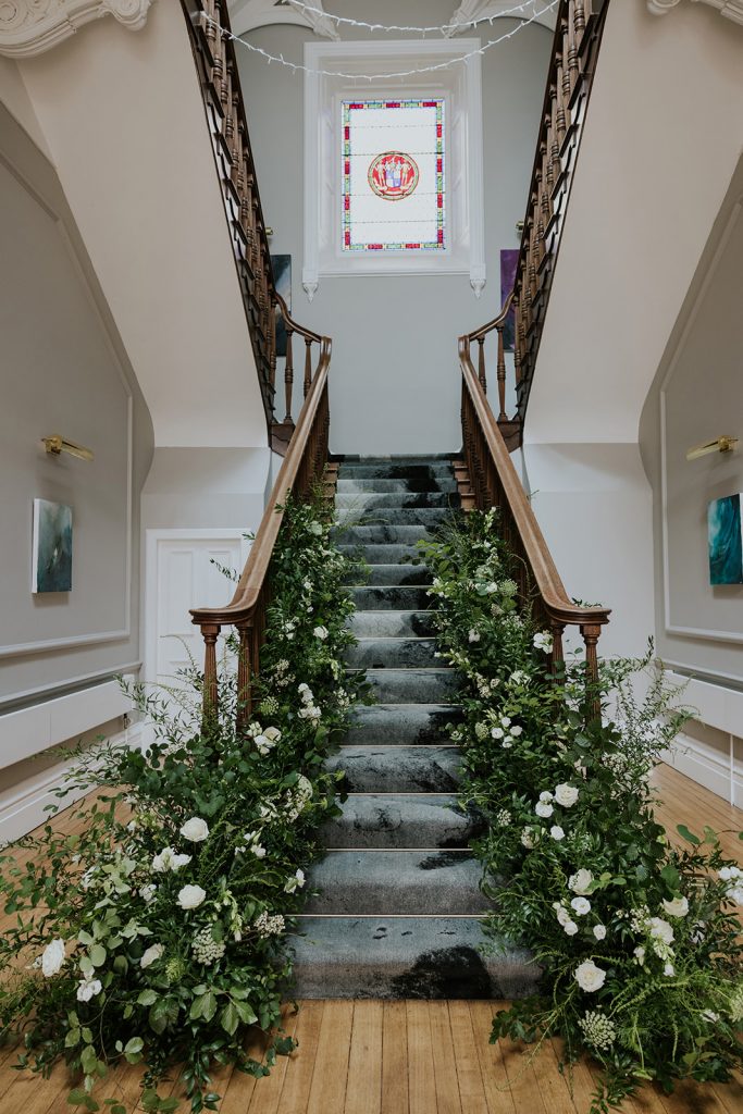 A meadow of flowers up the Grand Hall staircase