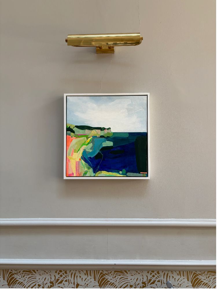 Artwork showing a headland beach scene