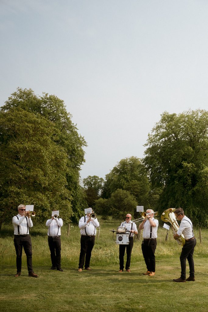 A brand band play in a garden